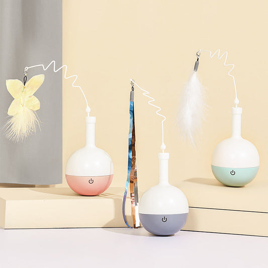 Playful feline wand with rolling ball and motion sensor.