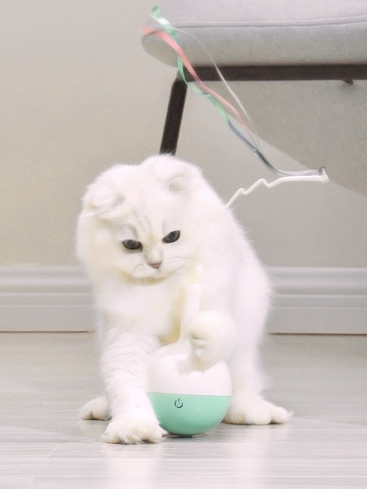 Playful feline wand with rolling ball and motion sensor.